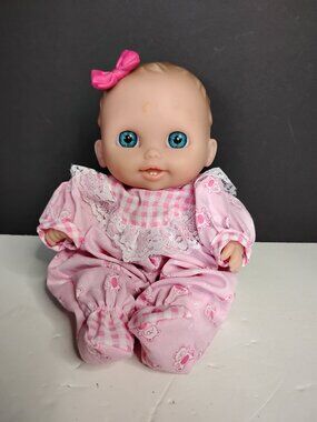Berenguer baby girl doll with blue eyes & bow